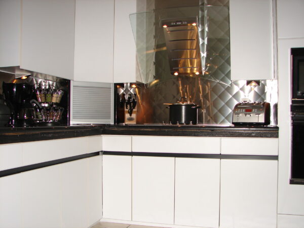 Quilted diamond stainless steel back splash installation